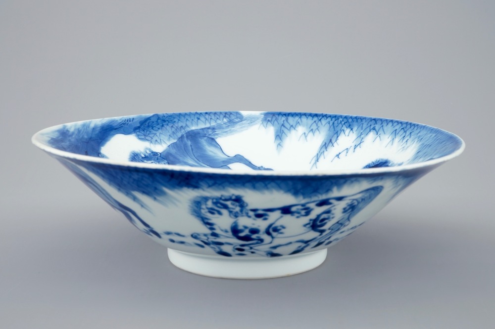 A Chinese blue and white conical bowl: "Horses of Mu Wang", Kangxi